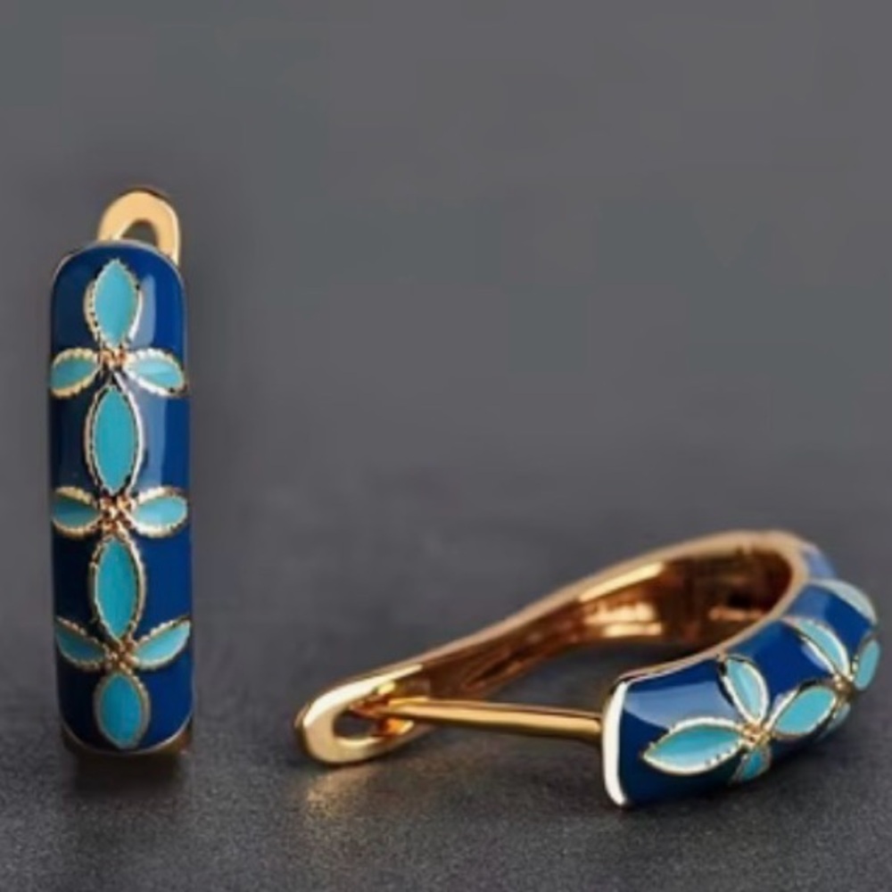 Gold plated hoop earrings with flower design